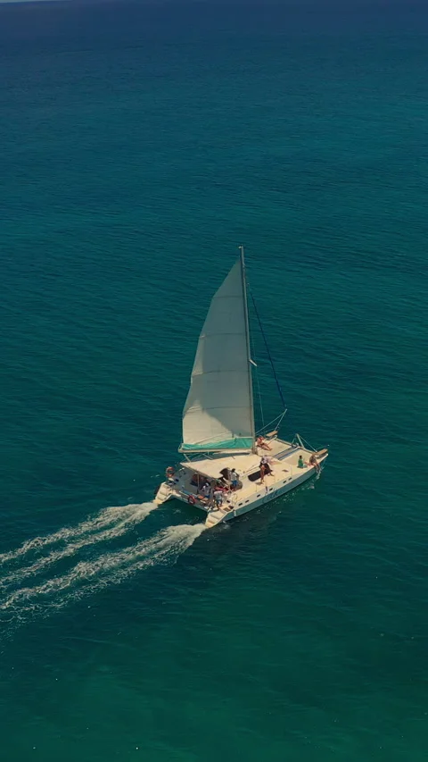 Drone flight over the Indian Ocean. Aerial footage, rear view of luxury sailboat Stock Footage 269779278