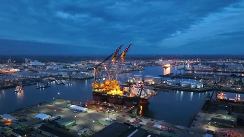 Drone flight over industrial area with cargo ports, heavy lifting crane Stock Footage 301855409