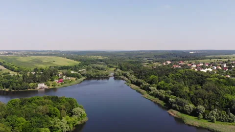 Drone flight over the lake and park. Beautiful landscapes Stockbeeldmateriaal 130272161