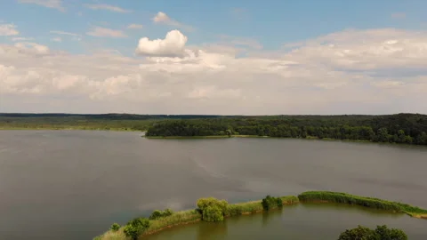 Drone flight over the lake and park. Beautiful landscapes Stockbeeldmateriaal 130274165