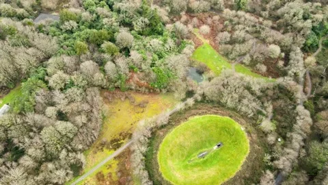 Drone flight over lake and irish sky garden crater Video stock 231145346