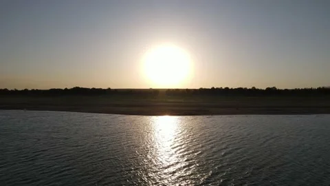 Drone flight over the lake during sunset Stock Footage 219411522
