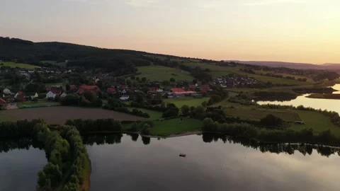 Drone flight over lake, Germany Video stock 141113376