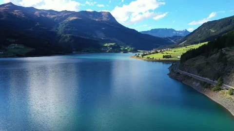 Drone flight over Lake Reschensee in South Tyrol Stock Footage 210822697