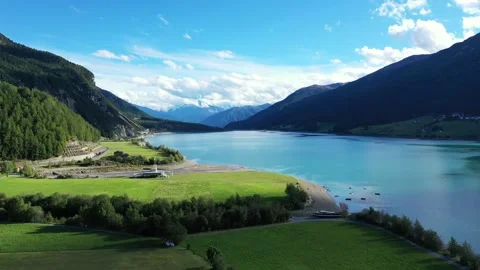 Drone flight over Lake Reschensee in South Tyrol Stock Footage 210823558