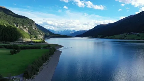 Drone flight over Lake Reschensee in South Tyrol Stock Footage 210824926