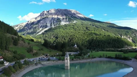 Drone flight over Lake Reschensee in South Tyrol Stock Footage 210824974