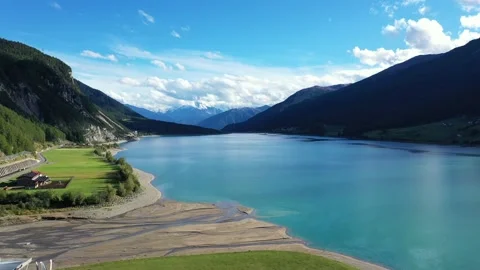 Drone flight over Lake Reschensee in South Tyrol Stock Footage 210828233