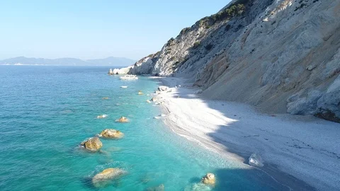 Drone flight over Lalaria Beach 스톡 동영상 104976128