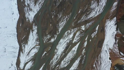 Drone Flight Over Landscape With Snow On Braided River Stock Footage 168775021