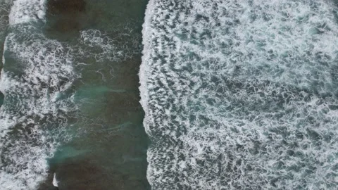 Drone Flight Over Large Foamy Waves on Sawangan Beach Stock Footage 237466120
