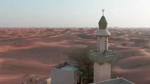 Drone flight over a lonely minaret in the desert Stock Footage 213965498