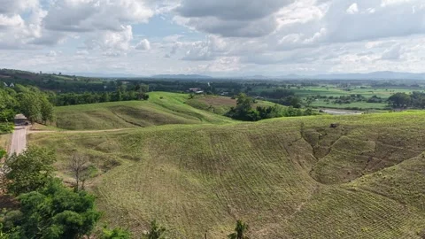Drone Flight Over Lush Hillside and Quiet Road Stock Footage 310883262