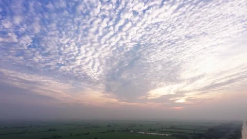Drone Flight Over Mekong Delta Countryside Under Altocumulus Sky at Dawn Stock Footage 344793623