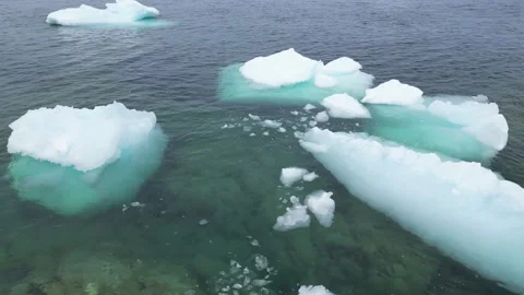 Drone Flight Over Minor Icebergs, Northeast Newfoundland Stock Footage 253213381