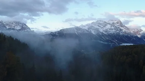 Drone flight over  the misty forests from the Dolomites Stock Footage 104161102