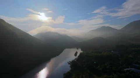 Drone Flight Over Misty River and Mountain Sunrise Stock Footage 336857165