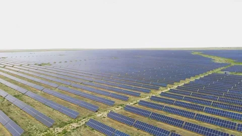 Drone flight over a modern field of alternative energy Stock Footage 135501230