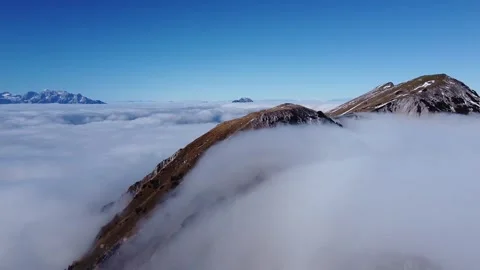 Drone Flight Over Mount Stol Above Sea of Clouds, Triglav Range on Horizon Stock Footage 328984958