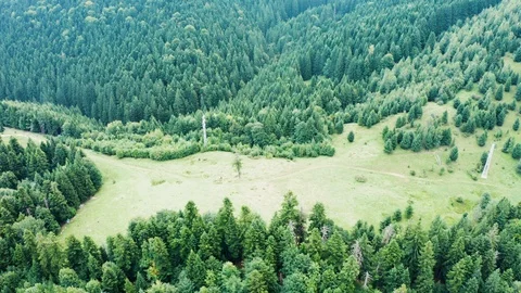 Drone flight over mountain with green forest Stock Footage 116990653