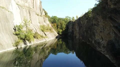 Drone Flight Over A Mountain Lake, A Hidden Lake in Prague, prokopské Stock Footage 213499025