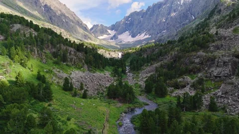 Drone flight over the mountain lake and Kuyguk waterfall in Altai Stock Footage 289121044