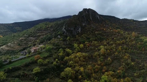 Drone flight over mountain peak in autumn Stock Footage 121726373