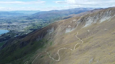 Drone Flight Over Mountain Road Leading to the Summit | Majestic Nature in 4K 스톡 동영상 312340021