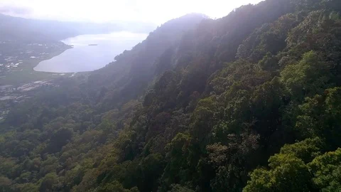 Drone flight over Mountainous Forest with Lake - 4K Stock Footage 84025278
