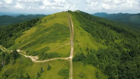 Drone flight over mountainous terrain, beautiful landscape. Beautiful mountain Stock Footage 283027572