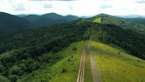 Drone flight over mountainous terrain, beautiful landscape. Beautiful mountain Stock Footage 283223046