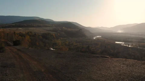 Drone flight over the mountains and the river. Golden autumn Stock Footage 130276705