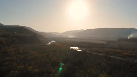 Drone flight over the mountains and the river. Golden autumn Stock Footage 130277010