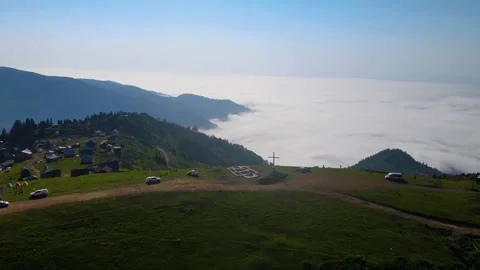Drone flight over the mountains and thick white clouds. Gomis Mta Georgia Stock Footage 168529109