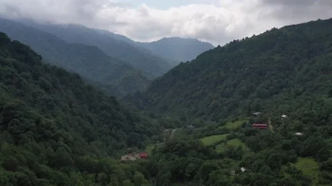 Drone flight over the mountains in cloudy weather Stock Footage 151194430
