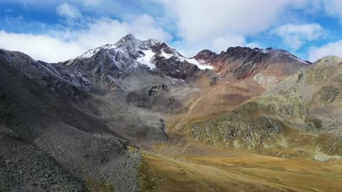 Drone flight over mountains Kurzras in South Tyrol Stock Footage 210834099