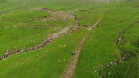 Drone flight over the mountains. trip in the mountains on a quadcopter Stock Footage 158543061