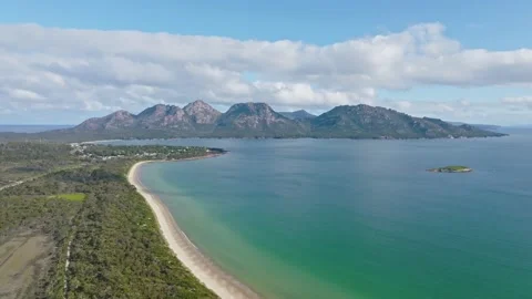 Drone flight over Muirs beach, Coles Bay &amp; Hazards mountains, Tasmania Stock Footage 169264882