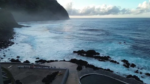 Drone Flight Over Natural Volcanic Pools and Atlantic Ocean in Porto Moniz, Made Video stock 327973760
