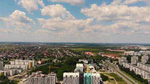 Drone flight over new buildings in Lviv. Summer sunny day Stock Footage 130273596