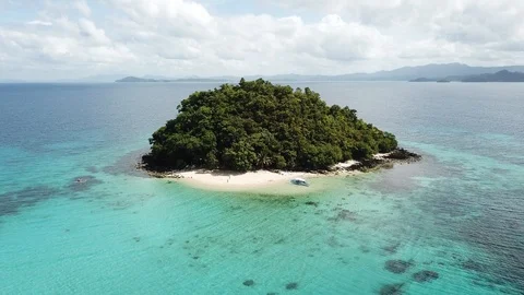 Drone flight over ocean and island in Philippines 스톡 동영상 93873518