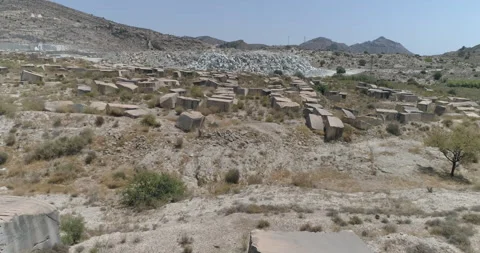 Drone flight over old abandoned quarry in the desert Stock Footage 210232841