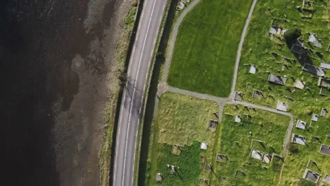 Drone flight over the old catalic cemetery near the river with a bridge Stock Footage 234111474
