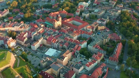 Drone flight over old town in Europe, beautiful old houses with red tiled roof Stock Footage 225665532