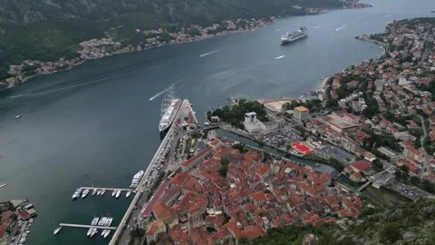Drone flight over the Old Town of Kotor and a view of the Bay of Kotor Stock Footage 252093969