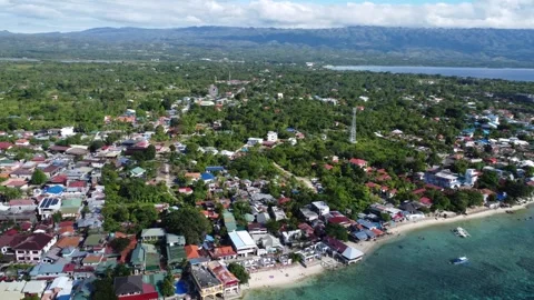 Drone flight over Panagsama Beach in Moalboal Cebu Philippines 115 Stock-Footage 334635158