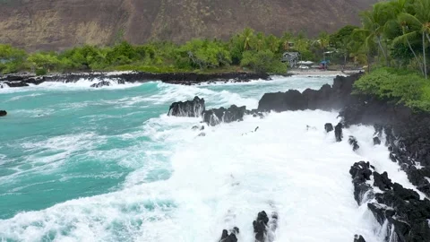 Drone Flight Over Powerful Waves Crashing on Volcanic Rocks Stock Footage 328388267