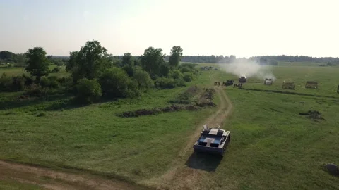 Drone flight over reconstruction battle scene German tank,Soviet troops in field Stock Footage 101068073