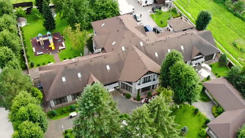 Drone flight over a restaurant located in the woods. Ecology and outdoor Stock Footage 143090087