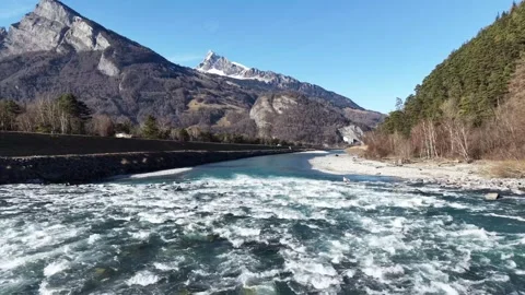 Drone flight over the Rhine River between Switzerland and Liechtenstein 스톡 동영상 329505872